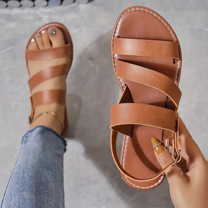 EM | Flache Sandalen mit offenem Rücken und Schnallendekor