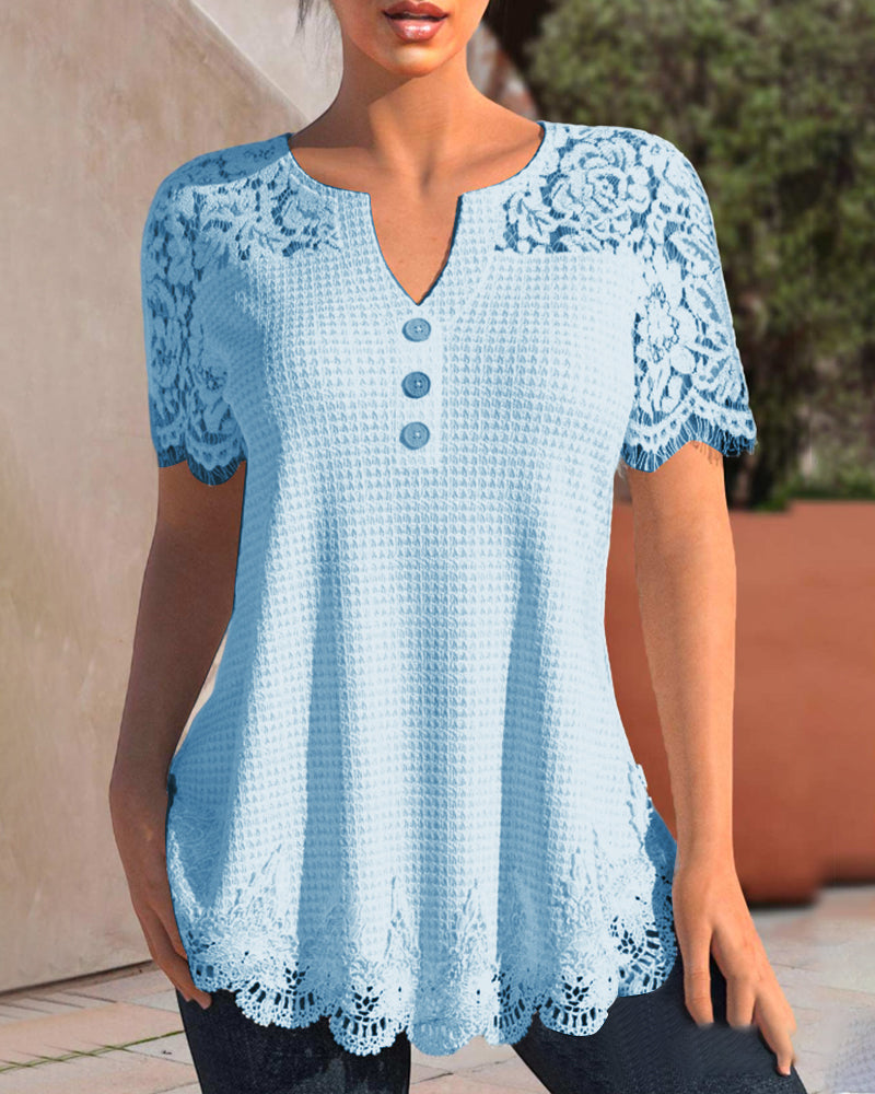 EM | Bluse aus strukturierter Spitze