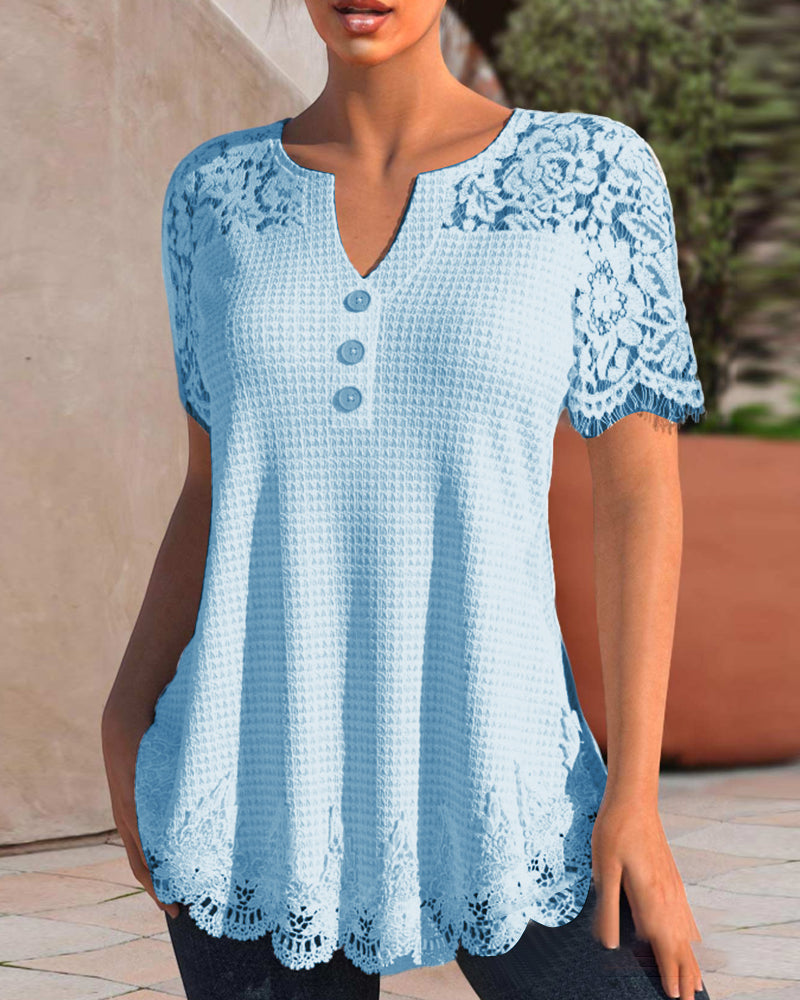 EM | Bluse aus strukturierter Spitze