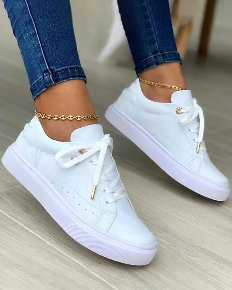 MW | Schicke Turnschuhe mit goldenen Details
