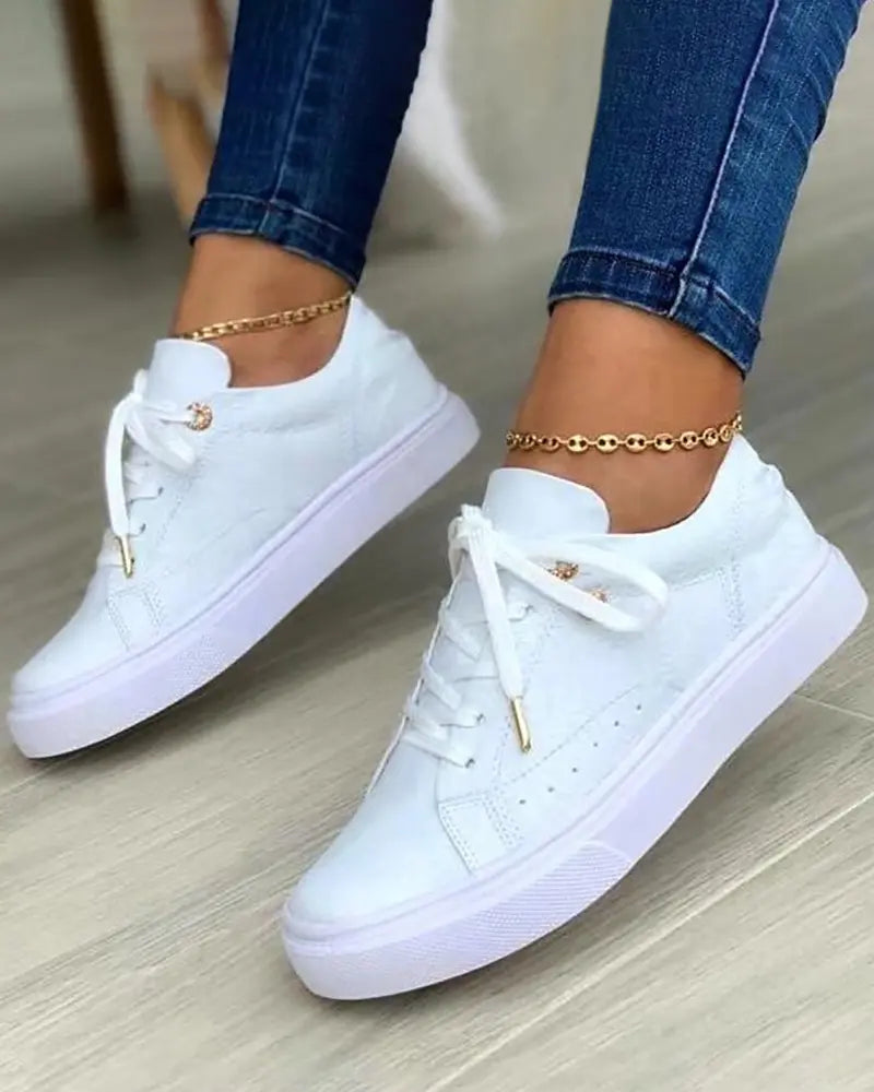 MW | Schicke Turnschuhe mit goldenen Details