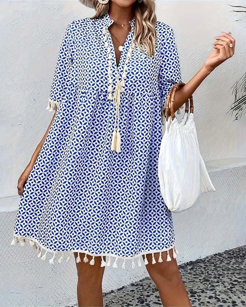 EM | Tania – Grooviges blaues Kurzarm-Minikleid
