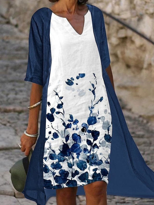 EM | Linda – Zweiteiliges Midikleid mit blauem Blumendruck und eleganten Halbärmeln