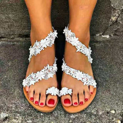 EM | Elegante Sandalen aus Spitze