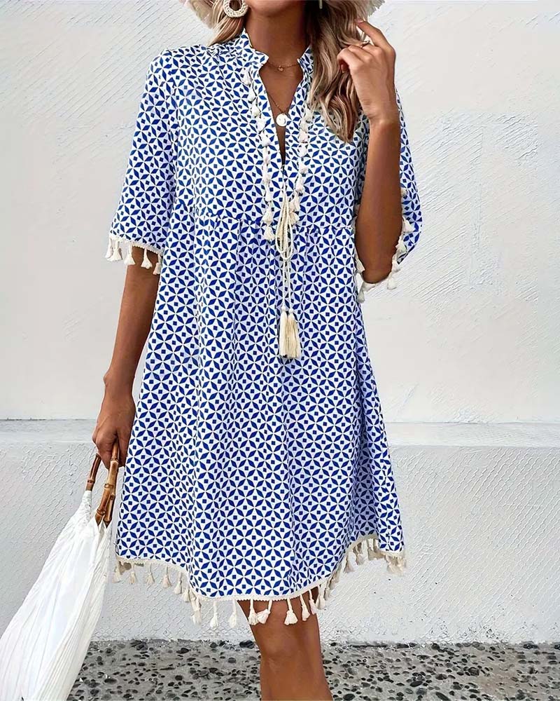 EM | Tania – Grooviges blaues Kurzarm-Minikleid
