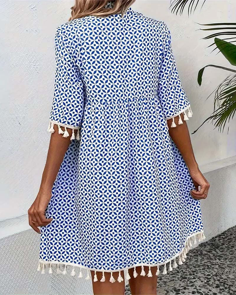 EM | Tania – Grooviges blaues Kurzarm-Minikleid