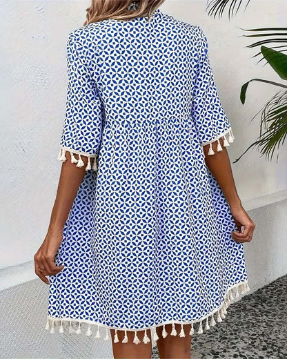 EM | Tania – Grooviges blaues Kurzarm-Minikleid