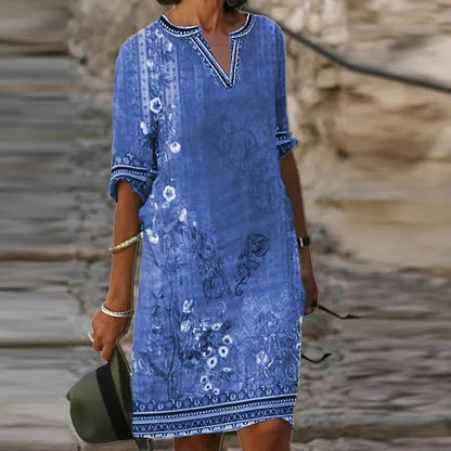 EM | Grünes Midikleid mit V-Ausschnitt und Blumenmuster
